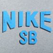 Camiseta-Masculina-Nike-SB-Loose-Fit-Corte-Largo-CINZA